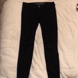 black jeans w/ small rips on the knees